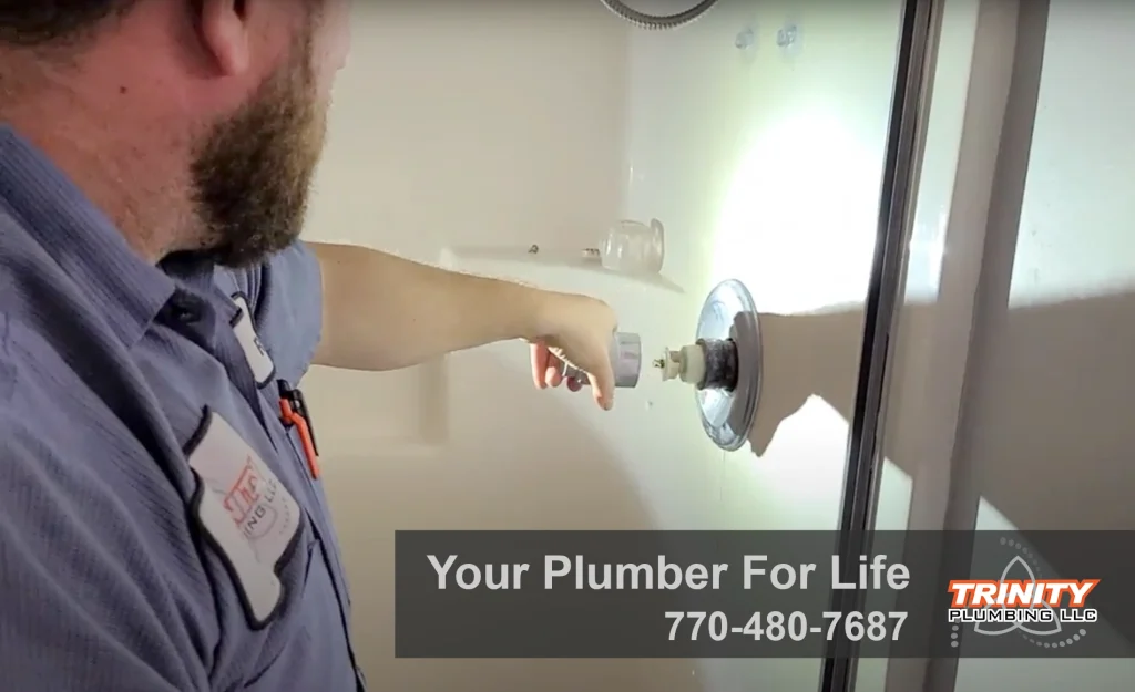 Master Plumber for Dallas GA Residents Trinity Plumbing LLC fixing shower dip due to high water pressure